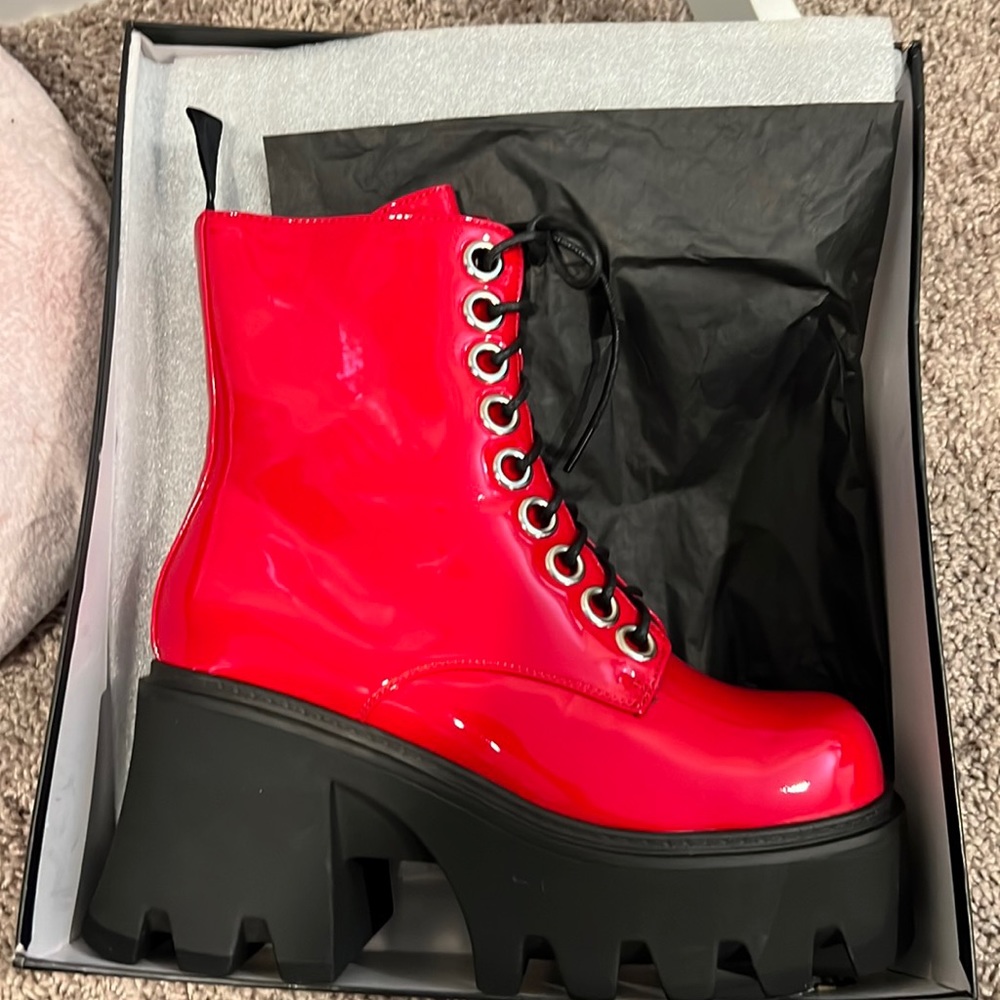 Brand new red patent Lamoda boots.